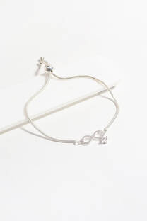 Pulsera de acero quirurgico blanco con dije strass. - 