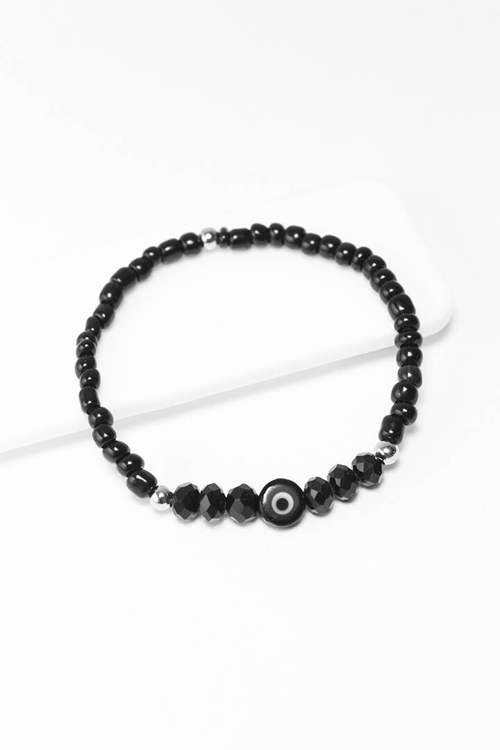 Imagen producto Pulsera elástica de cuentas y dije. 1